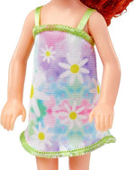 Mattel Barbie Chelsea- Majhna lutka v odstranljivi cvetlični obleki (HNY56)
